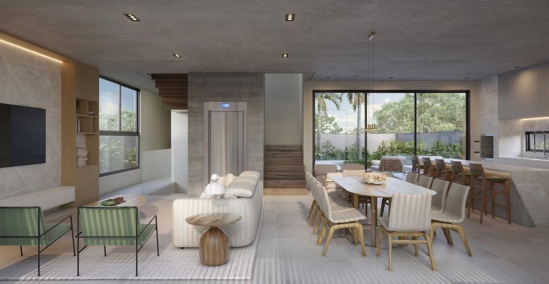 Estudo tridimensional do living integrado da Casa BA, com sala de estar, jantar e cozinha em sequência, elevador residencial ao centro e escada de madeira ao fundo.