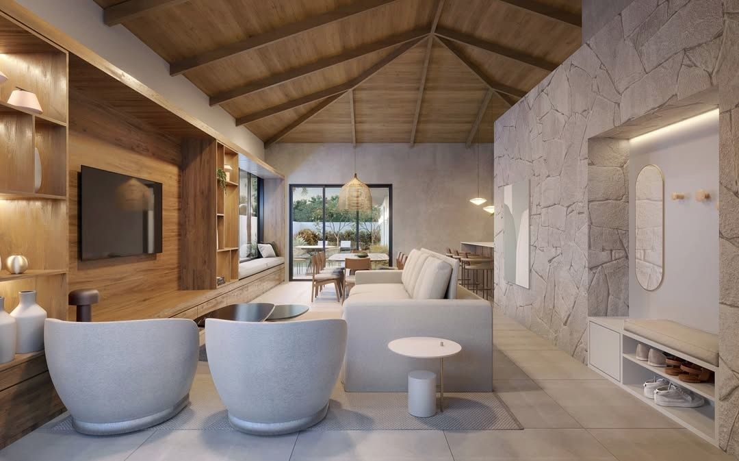 Estudo tridimensional da Casa JV: sala de estar com forro de madeira em tesoura e parede de pedra.