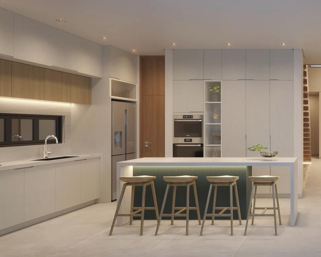 Estudo tridimensional da Casa CT: cozinha com ilha e banquetas, marcenaria ripada.