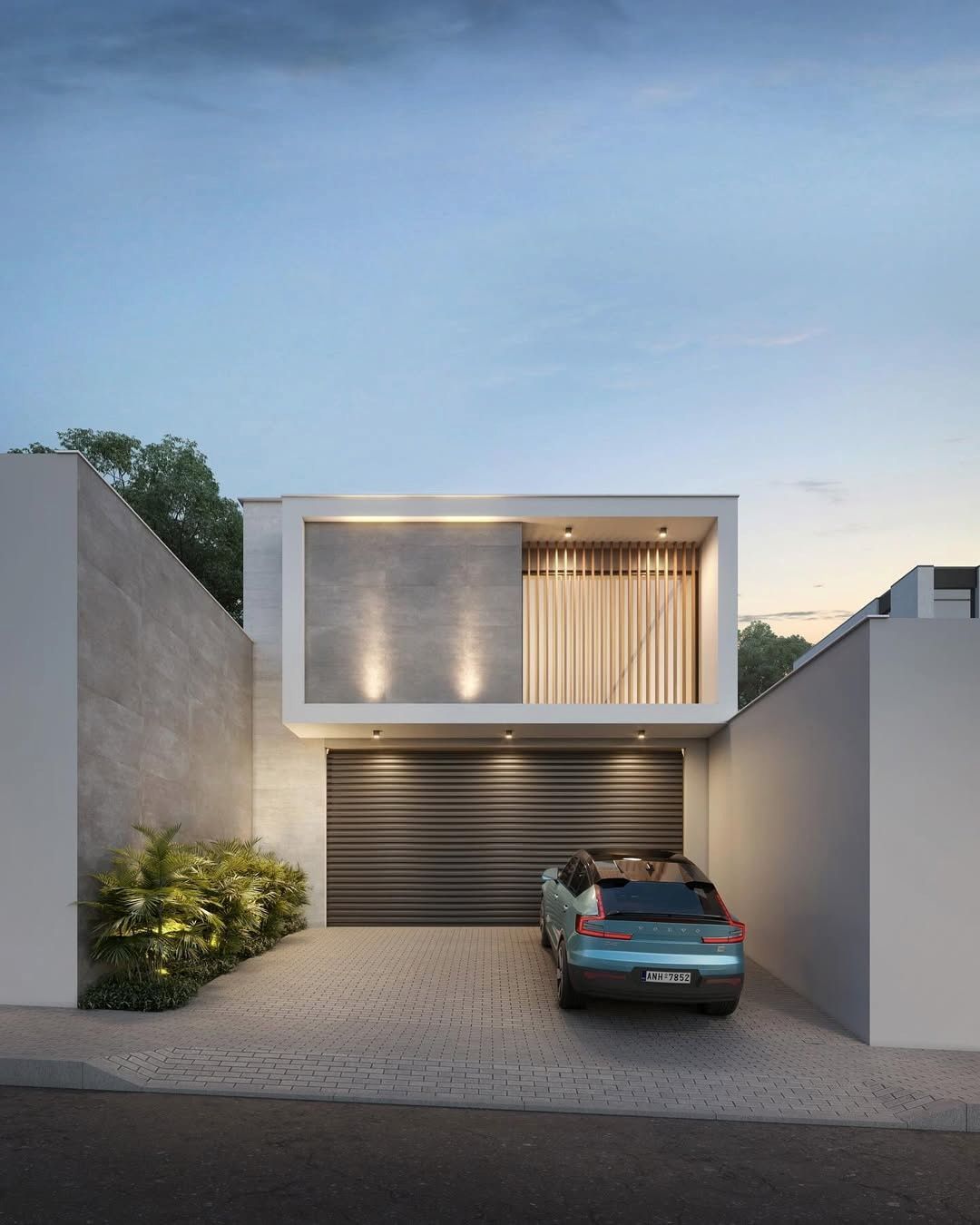 Estudo tridimensional da Comercial JE: fachada frontal noturna, volume branco suspenso sobre garagem.